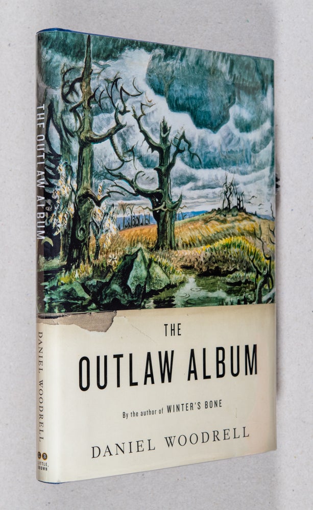 Item #0001242 The Outlaw Album. Daniel Woodrell.