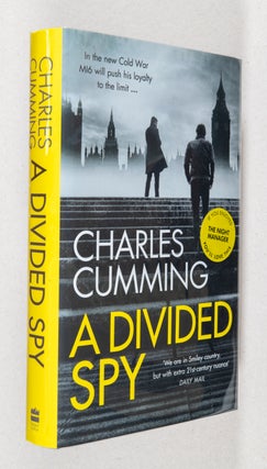 Item #0002375 A Divided Spy; (Thomas Kell Spy Thriller). Charles Cumming
