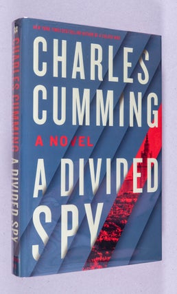 Item #0002658 A Divided Spy; (Thomas Kell Spy Thriller). Charles Cumming