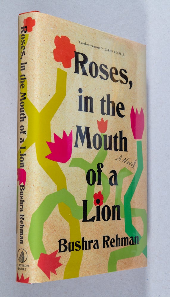 Item #0003465 Roses, in the Mouth of a Lion; A Novel. Bushra Rehman.