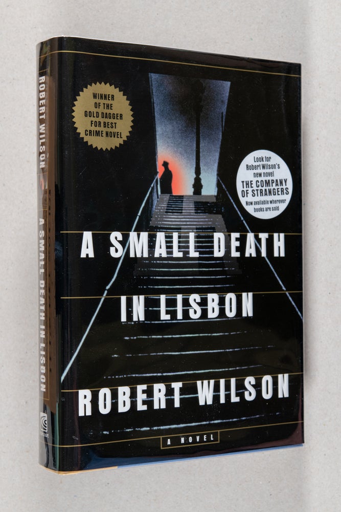 Item #000436 A Small Death in Lisbon; A Novel. Robert Wilson.