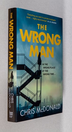 Item #0005169 The Wrong Man. Chris McDonald